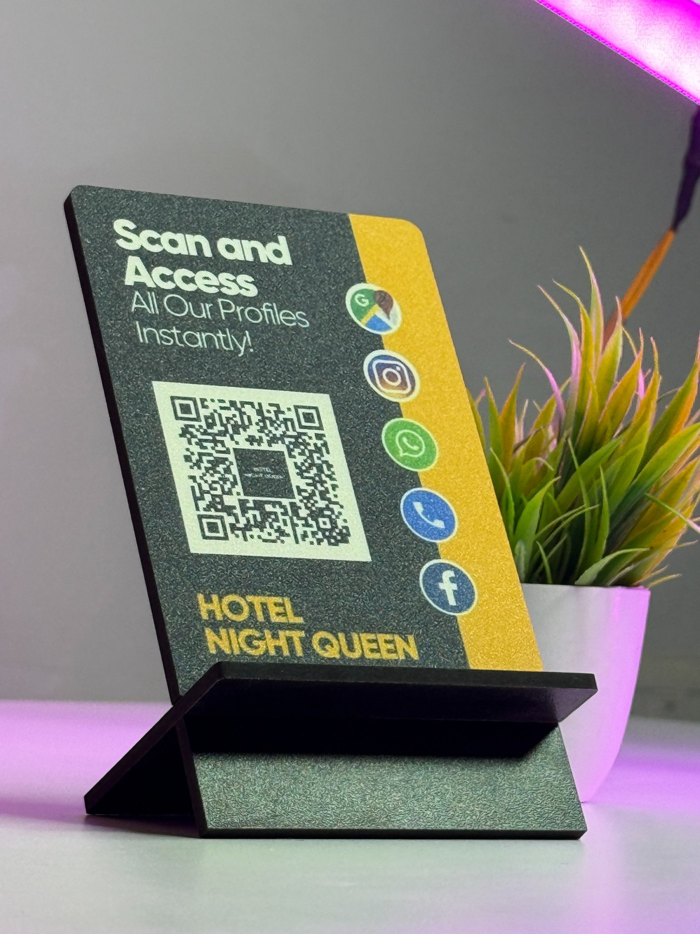 Hotel ScanEra standee with plant